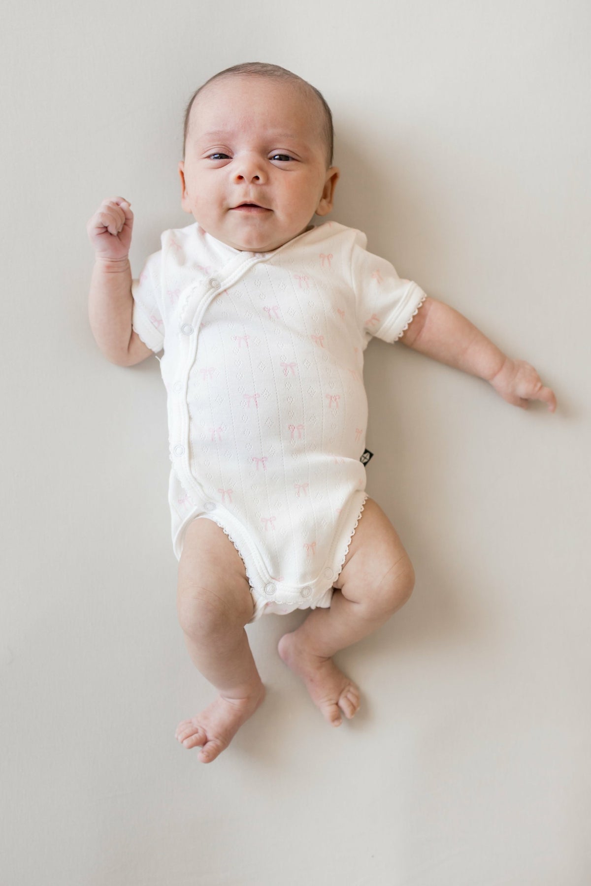 Kyte Baby Pointelle Kimono Bodysuit in Sweet Pink Bow