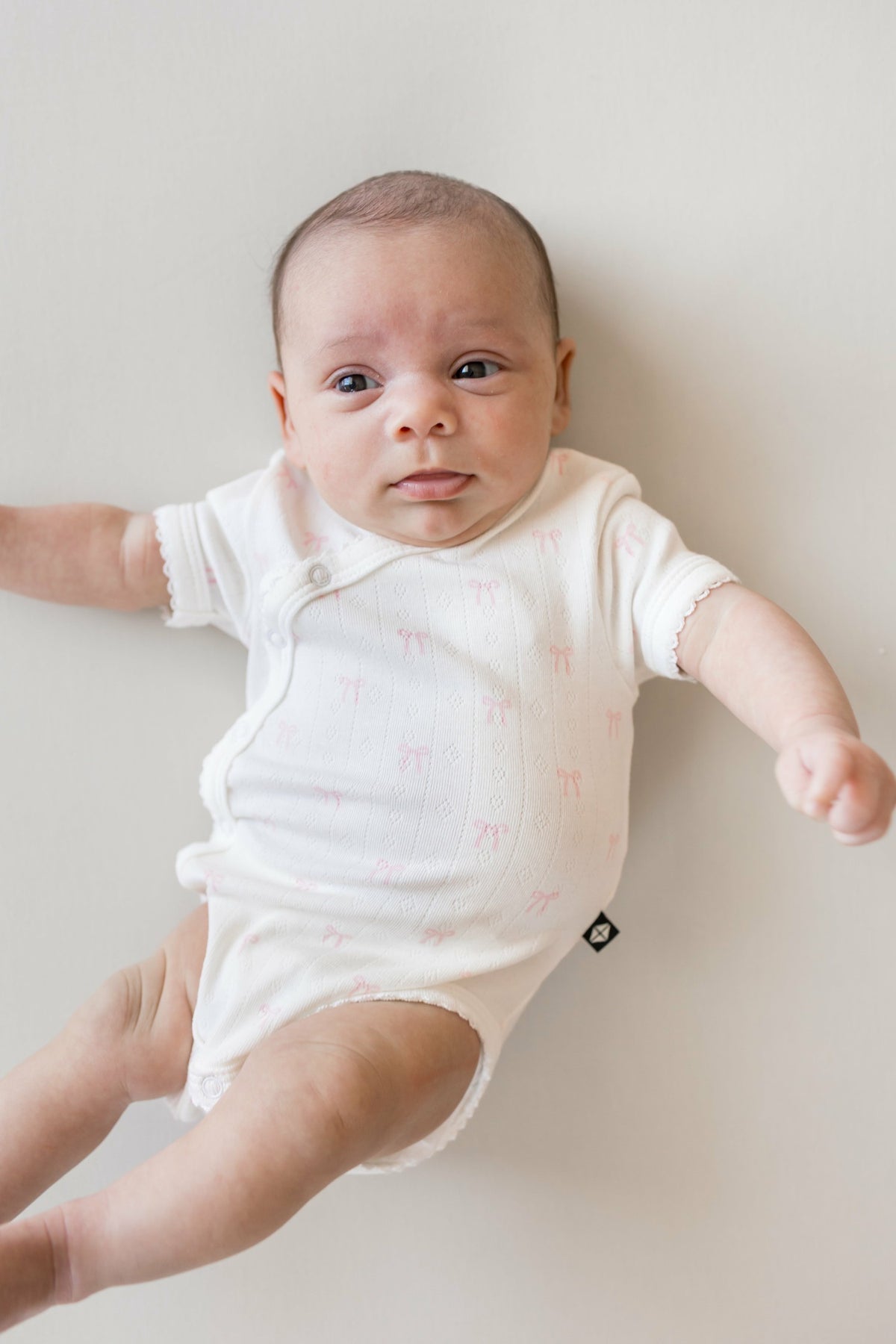 Kyte Baby Pointelle Kimono Bodysuit in Sweet Pink Bow