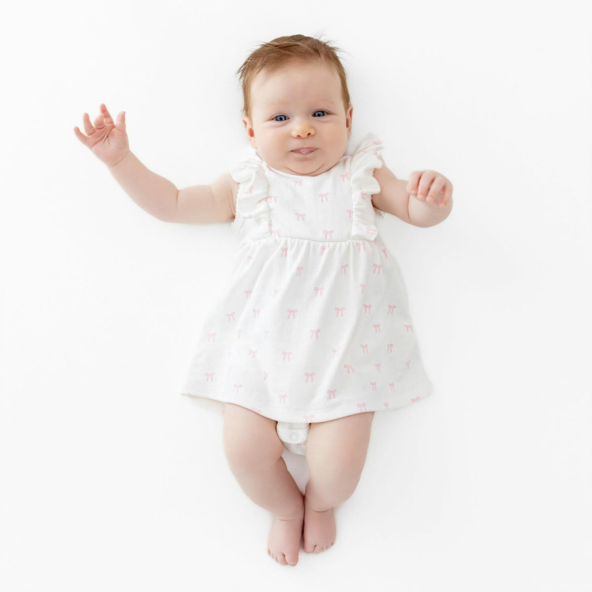Kyte Baby Pointelle Bodysuit Dress in Sweet Pink Bow
