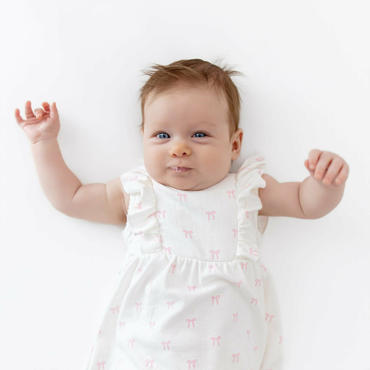 Kyte Baby Pointelle Bodysuit Dress in Sweet Pink Bow