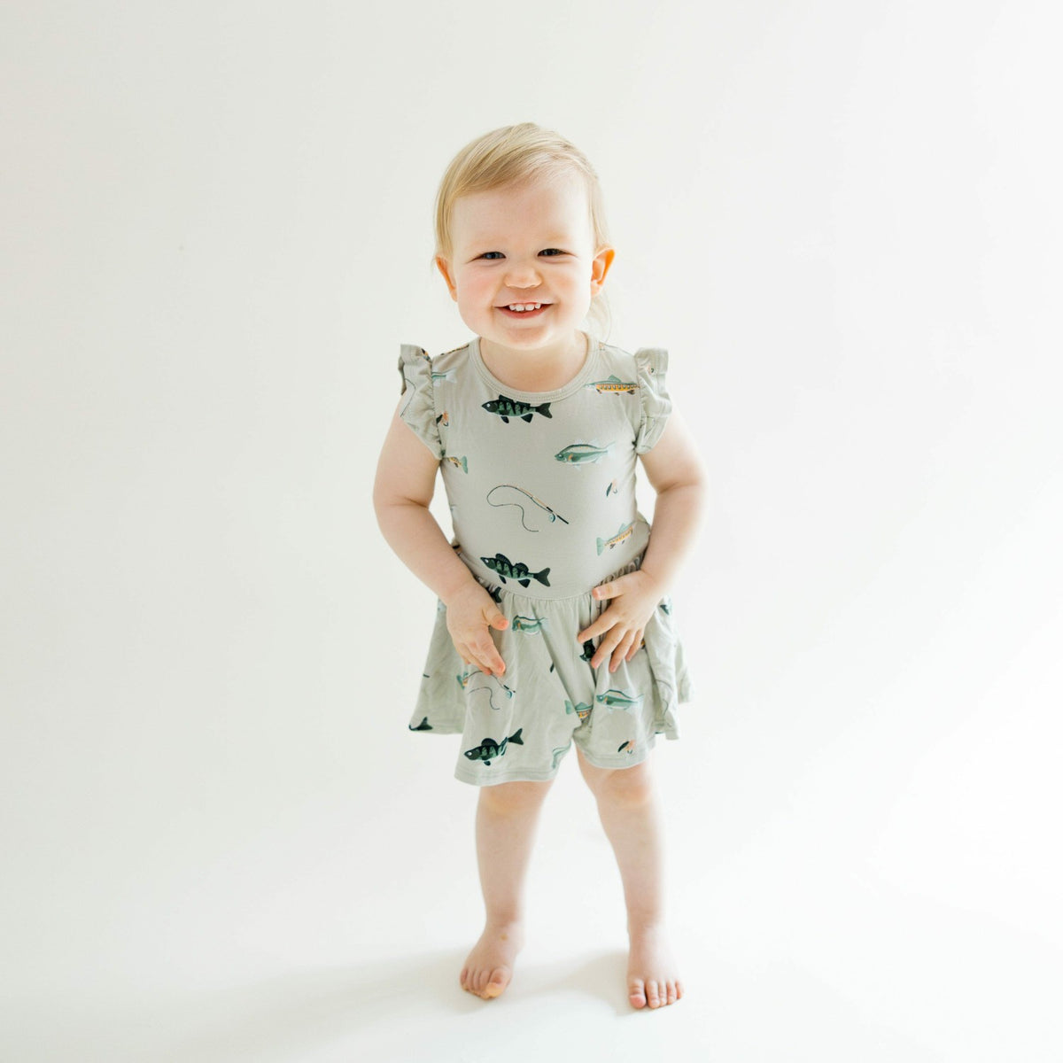 Kyte Baby Twirl Bodysuit Dress in Fishing