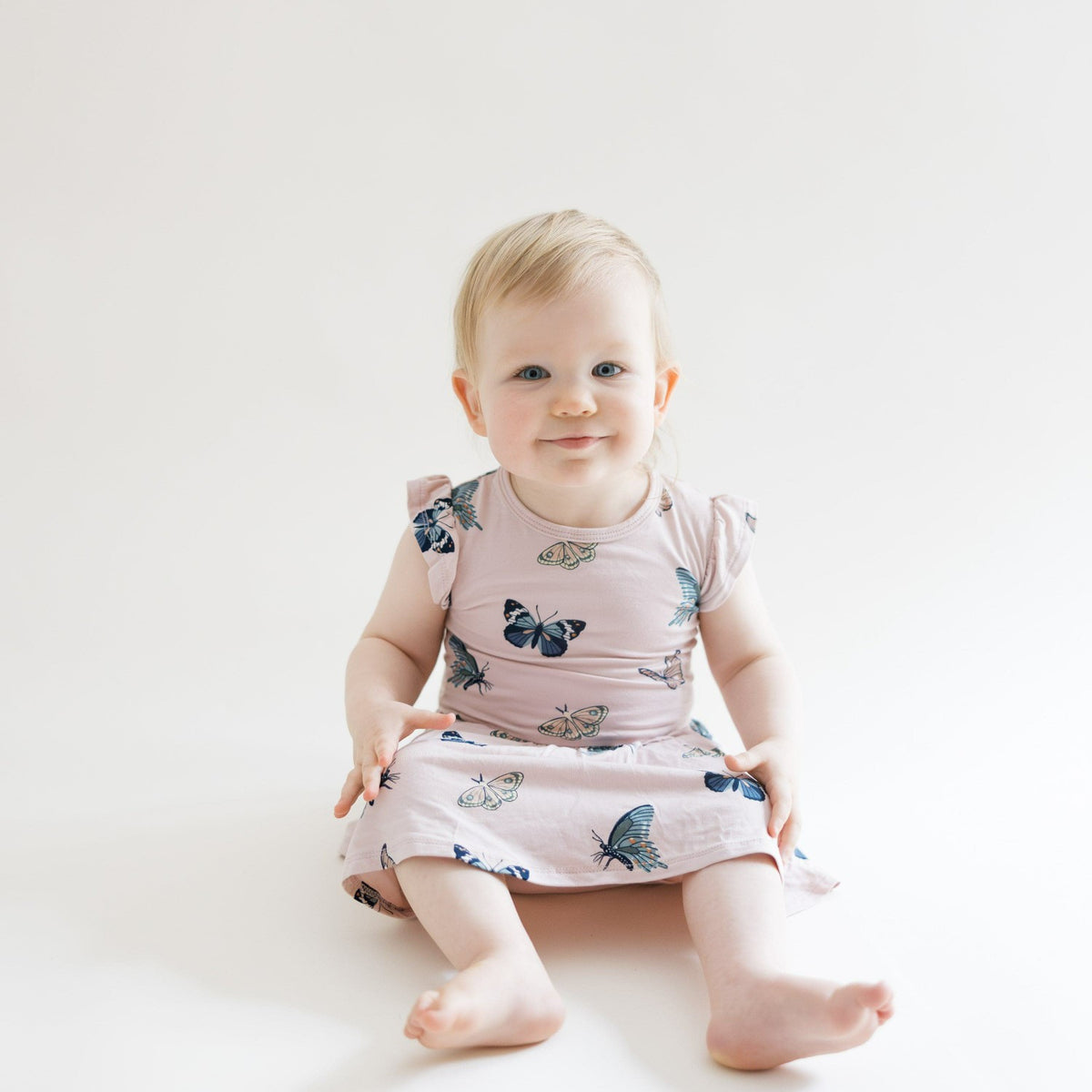 Kyte Baby Twirl Bodysuit Dress in Blush Butterfly