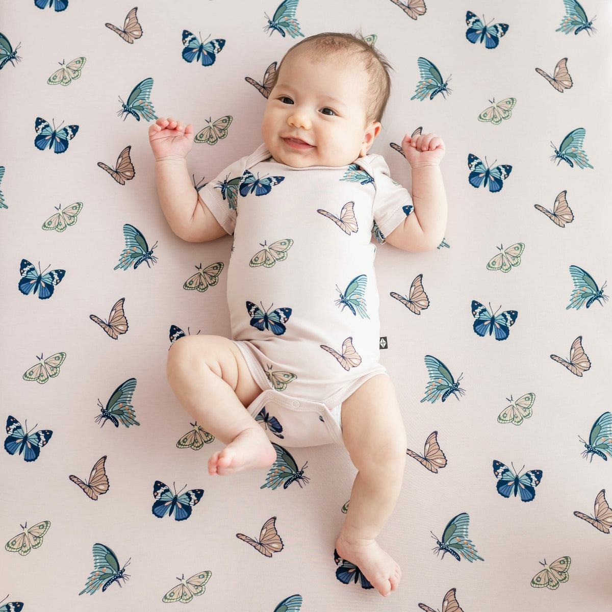 Kyte Baby Bodysuit in Blush Butterfly