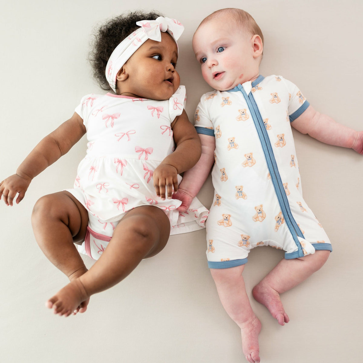Kyte Baby Twirl Bodysuit Dress in Bow