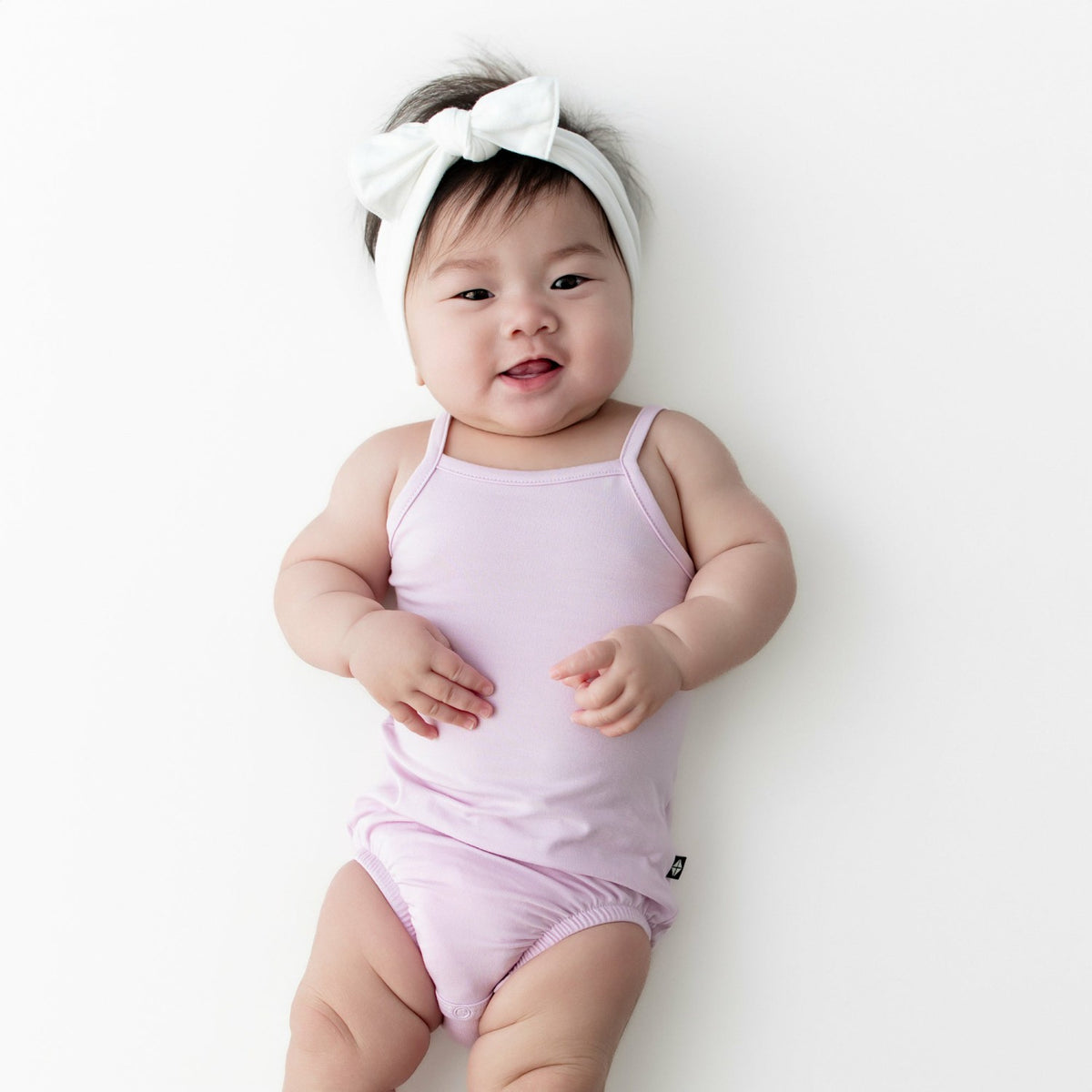 Kyte Baby Spaghetti Strap Leotard in Thistle