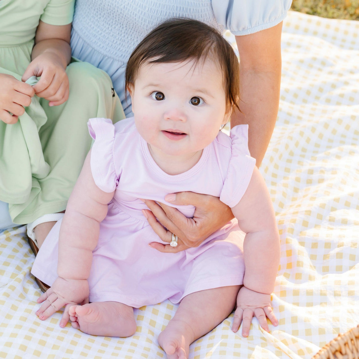 Kyte Baby Twirl Bodysuit Dress in Thistle