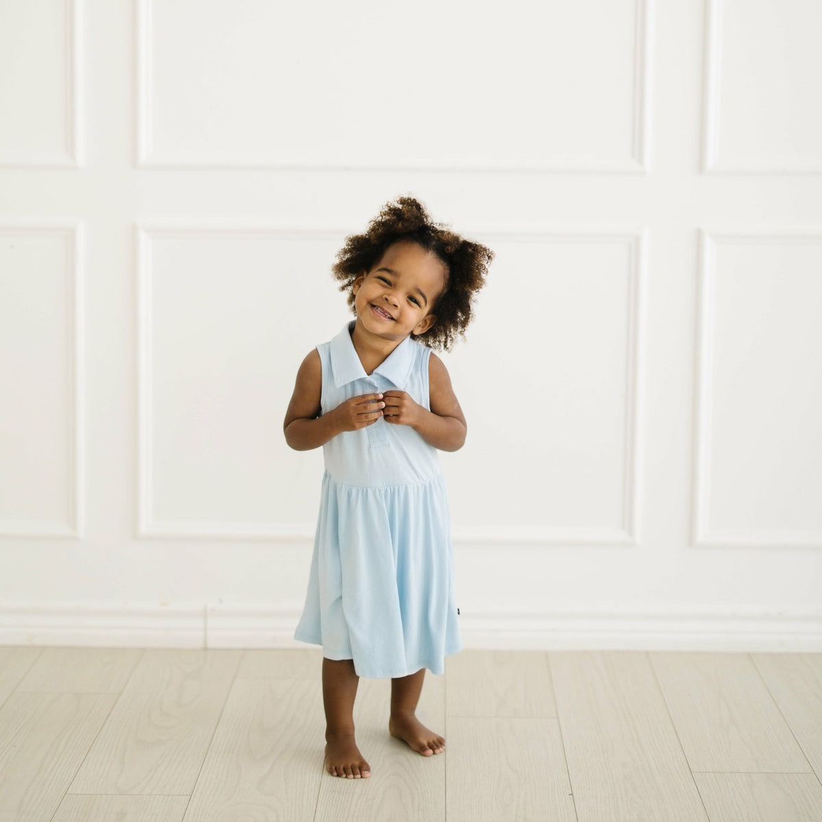 Kyte Baby Polo Bodysuit Dress in Breeze