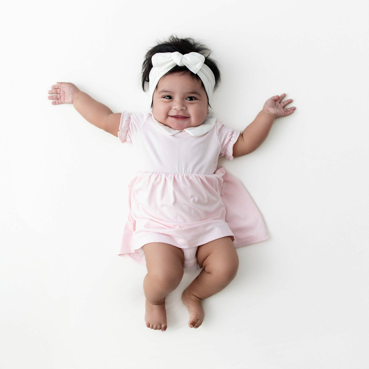 Kyte Baby Peter Pan Collar Bodysuit Dress in Sakura