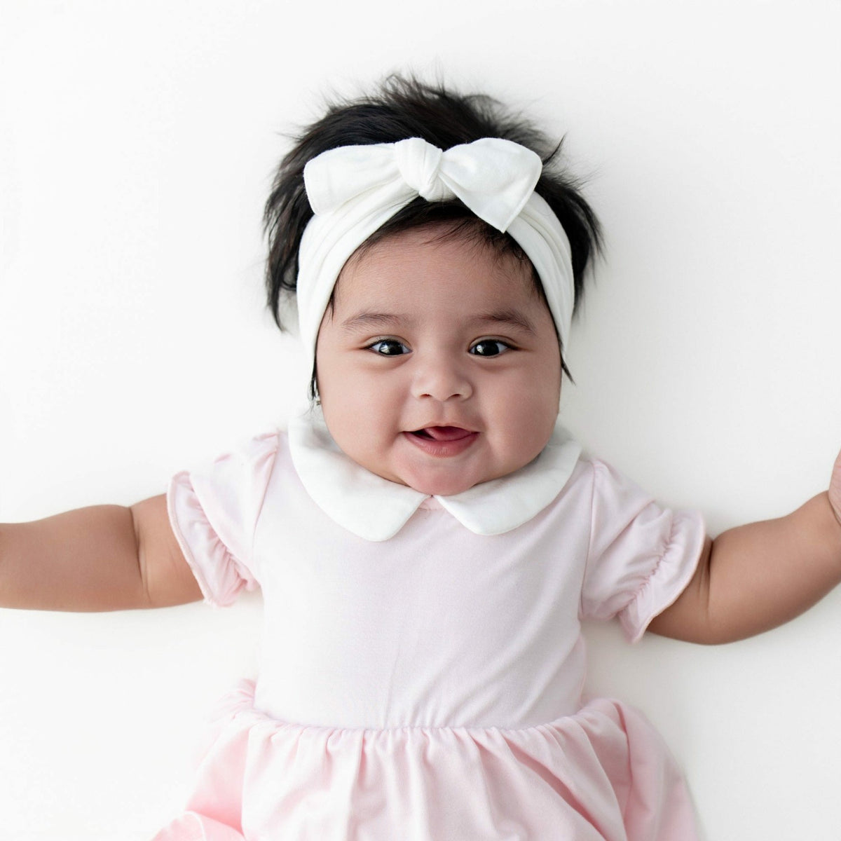 Kyte Baby Peter Pan Collar Bodysuit Dress in Sakura