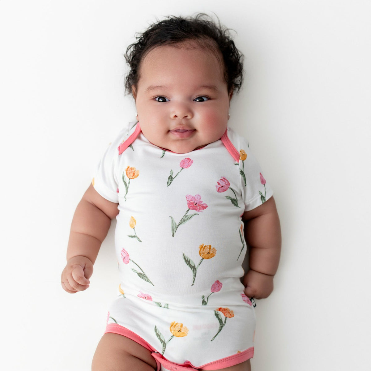 Kyte Baby Bodysuit in Tulip