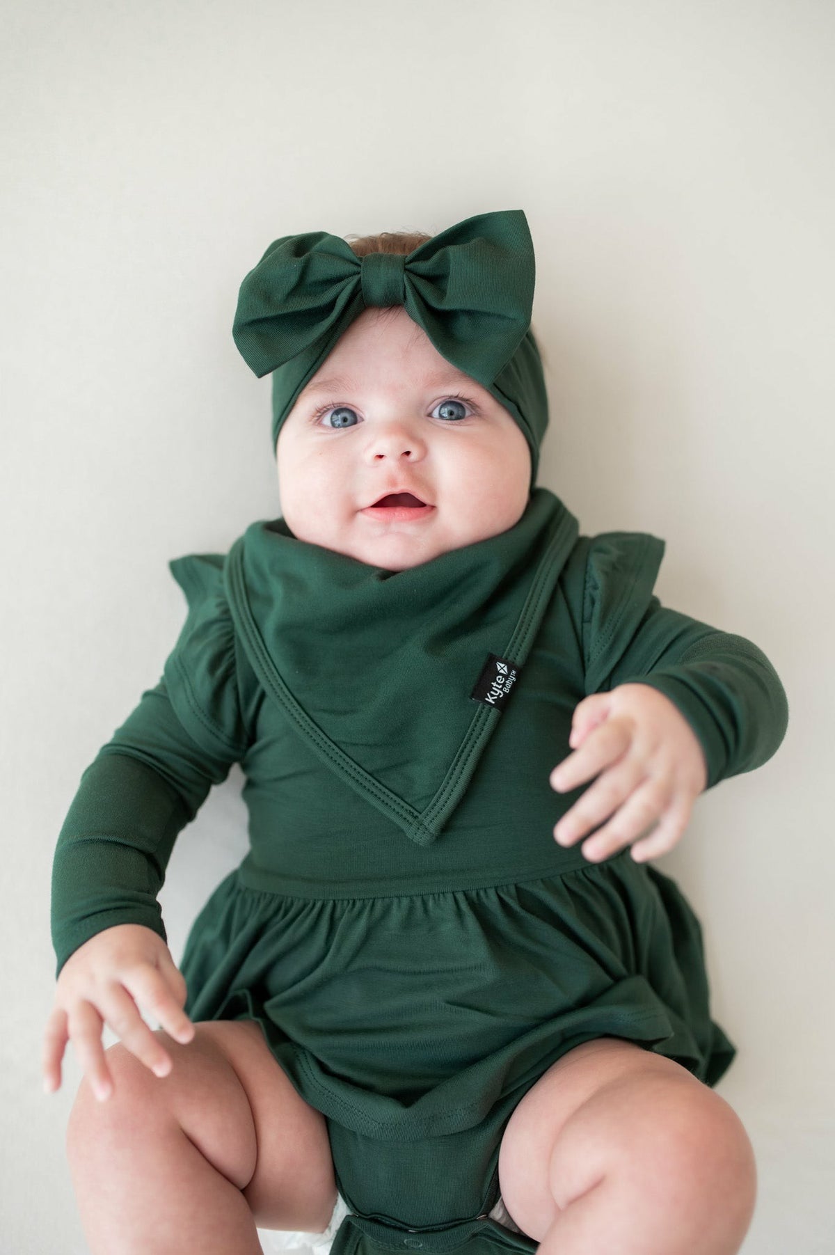 Kyte Baby Long Sleeve Twirl Bodysuit Dress in Cypress