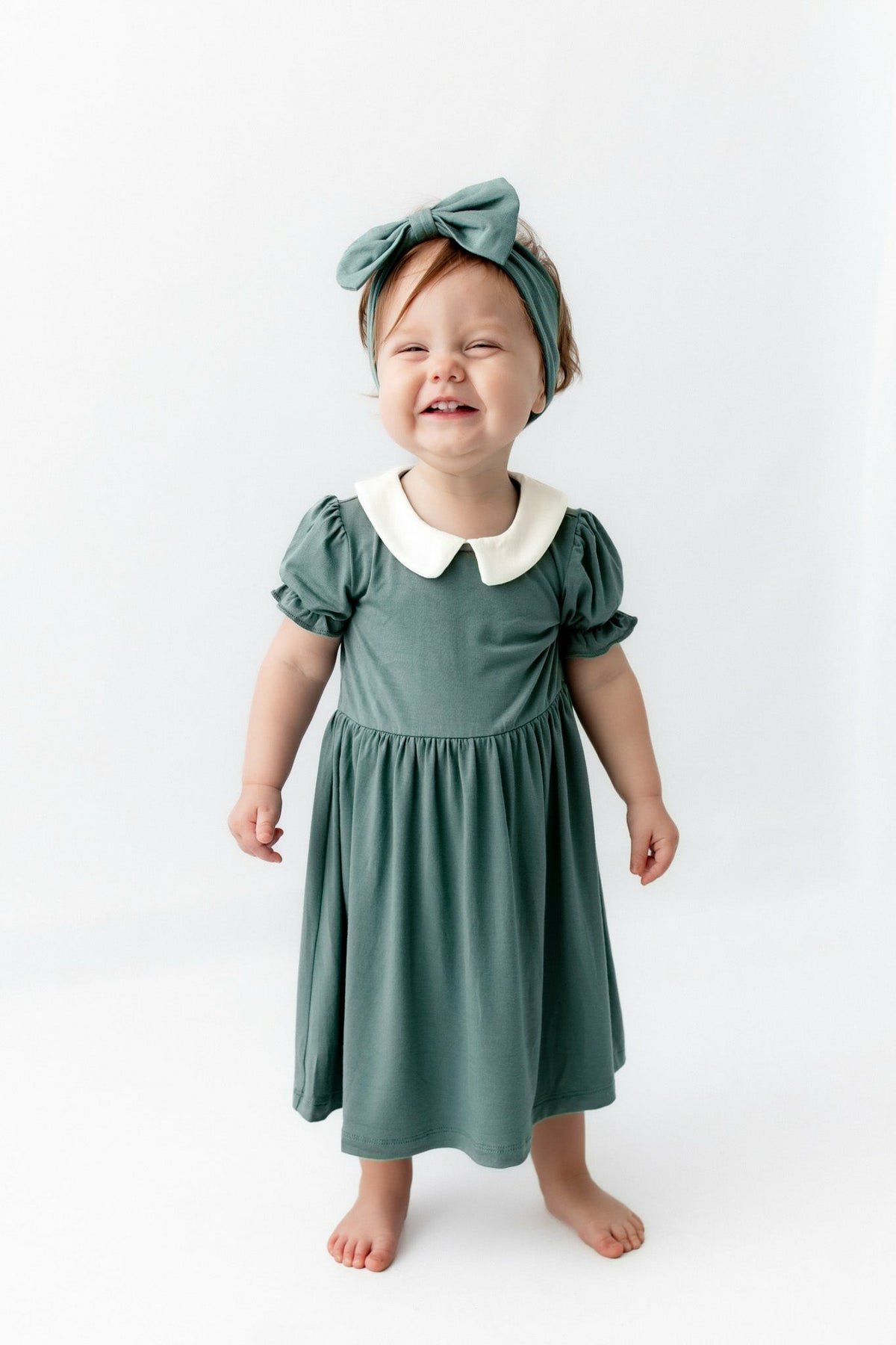 Kyte Baby Peter Pan Collar Bodysuit Dress in Pine
