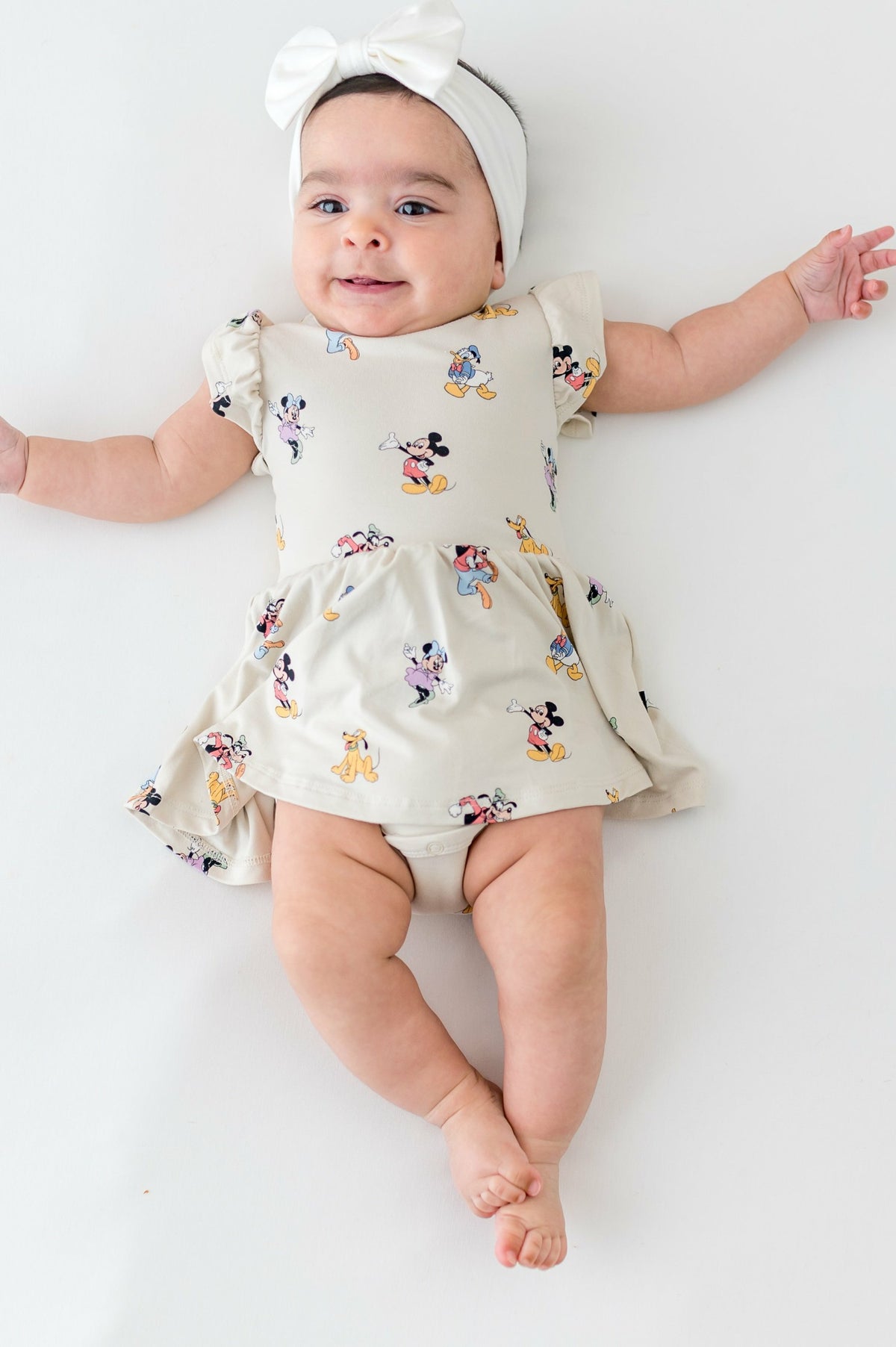 Kyte Baby Twirl Bodysuit Dress in Mickey Mouse and Friends