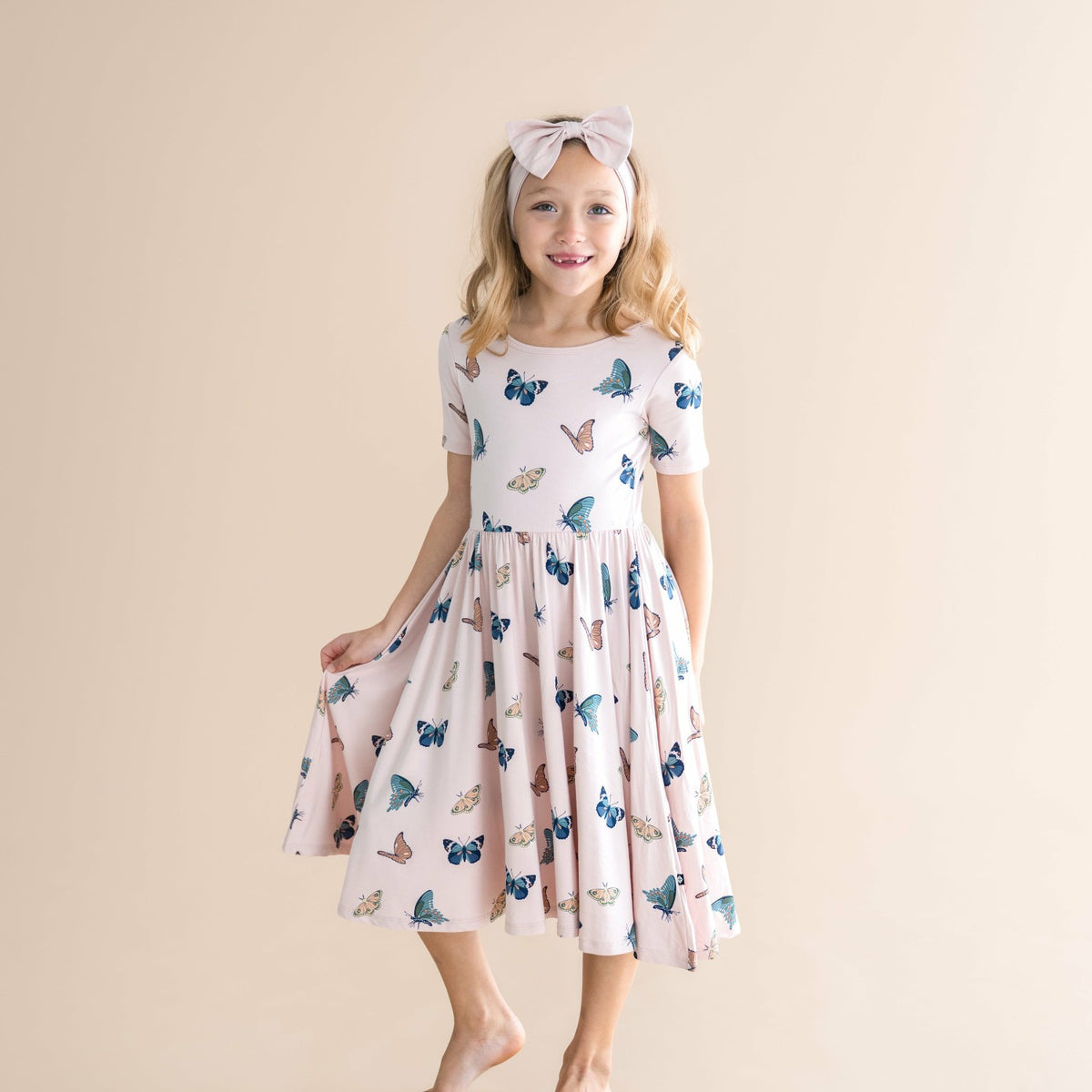 Kyte Baby Twirl Dress in Blush Butterfly