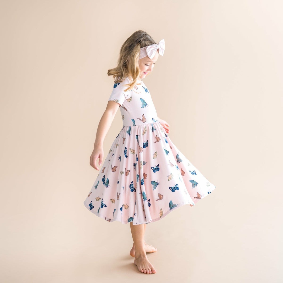 Kyte Baby Twirl Dress in Blush Butterfly