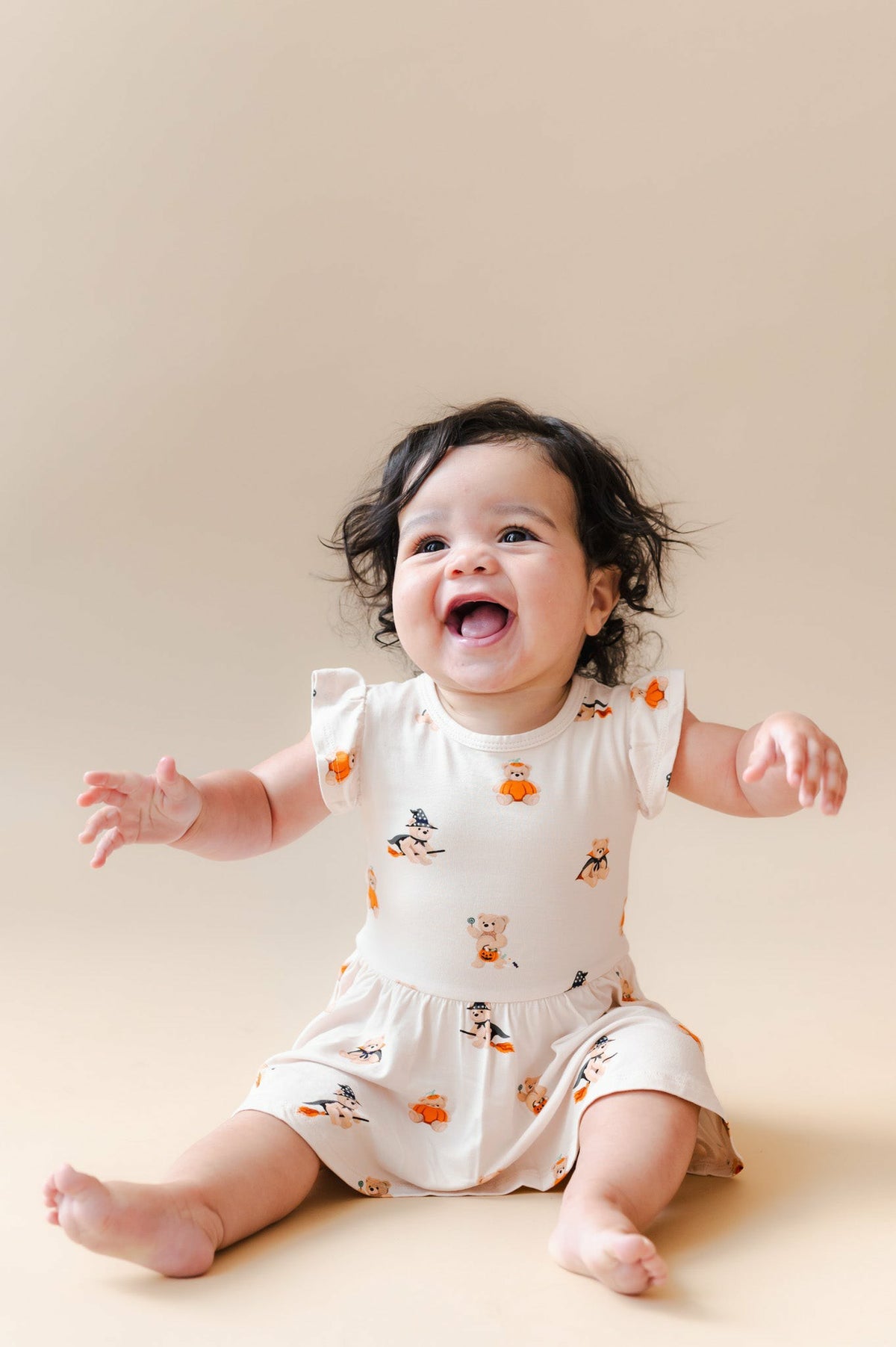 Kyte Baby Twirl Bodysuit Dress in Halloween Teddy