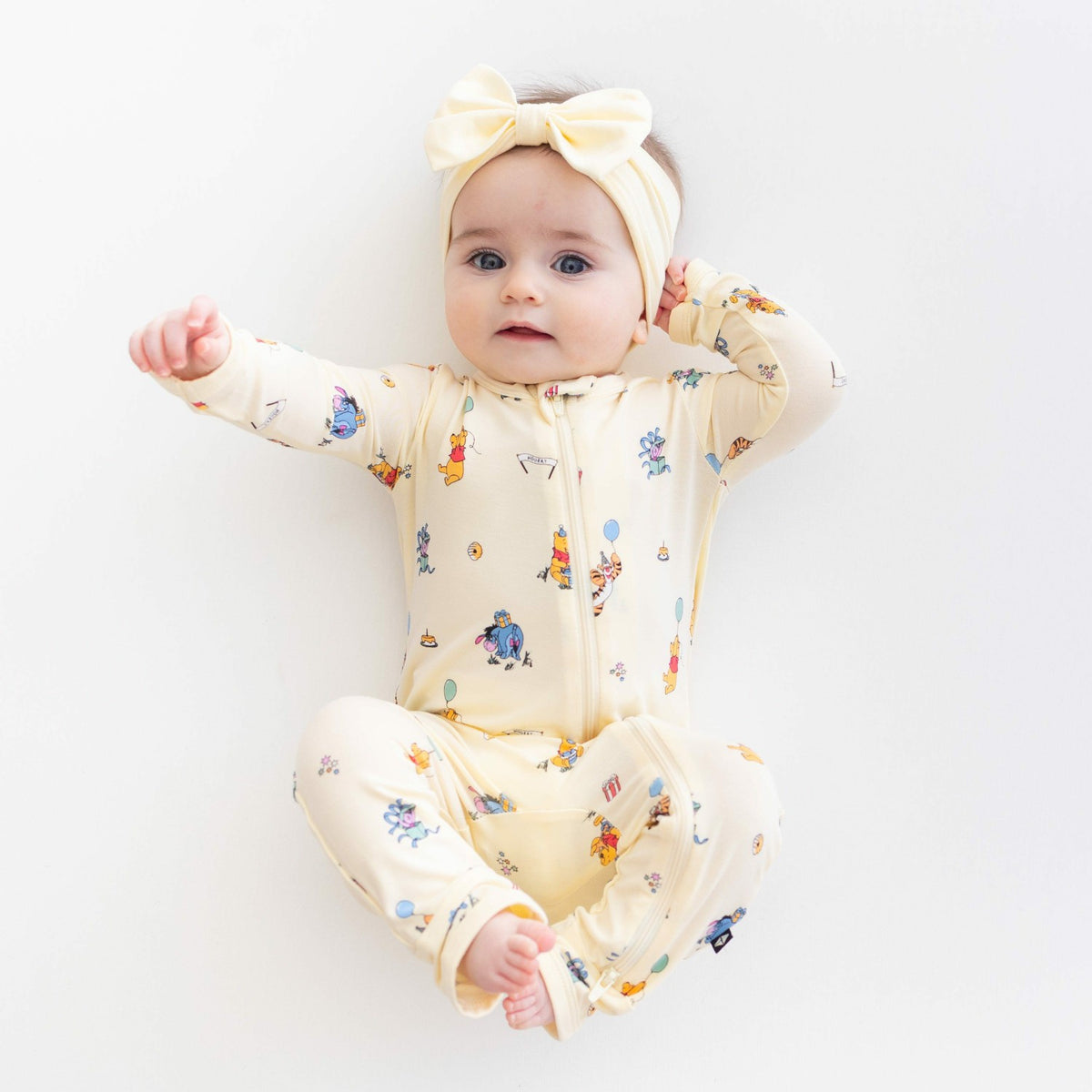 Kyte Baby Zippered Romper in Winnie the Pooh Celebration