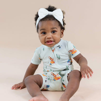 Kyte Baby Zipper Shortall Romper in Winnie the Pooh Hundred Acre Wood