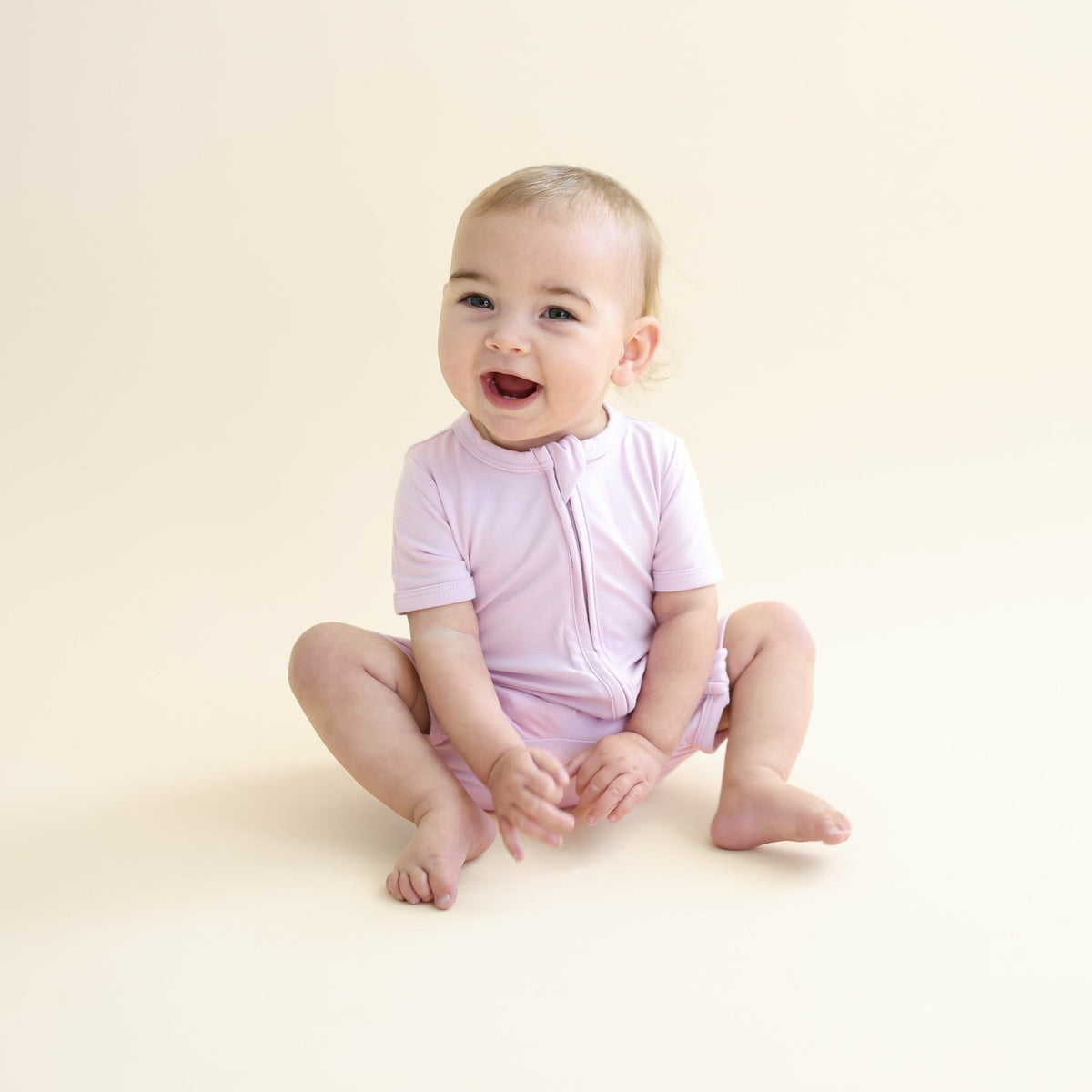 Kyte Baby Zipper Shortall Romper in Thistle
