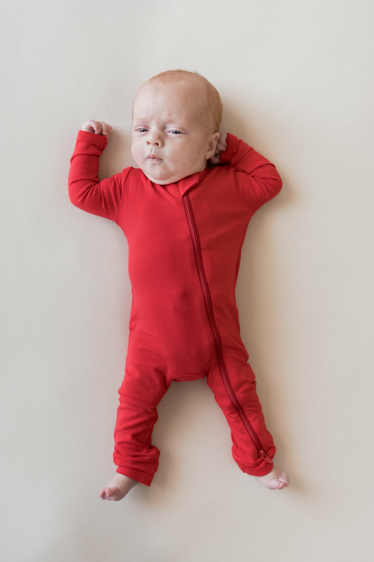 Kyte Baby Zippered Romper in Cardinal