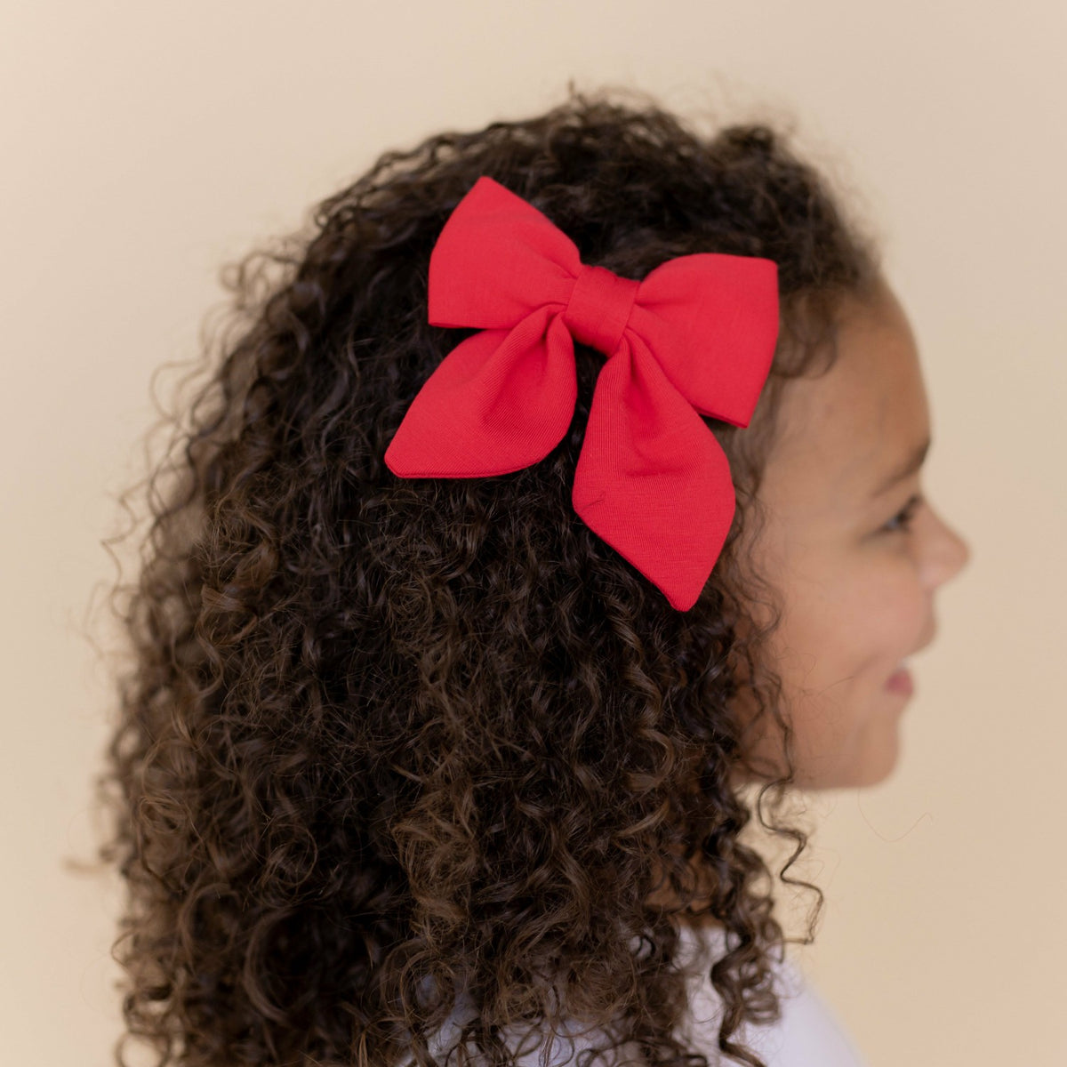 Kyte Baby Medium Alligator Clip Bow in Cardinal
