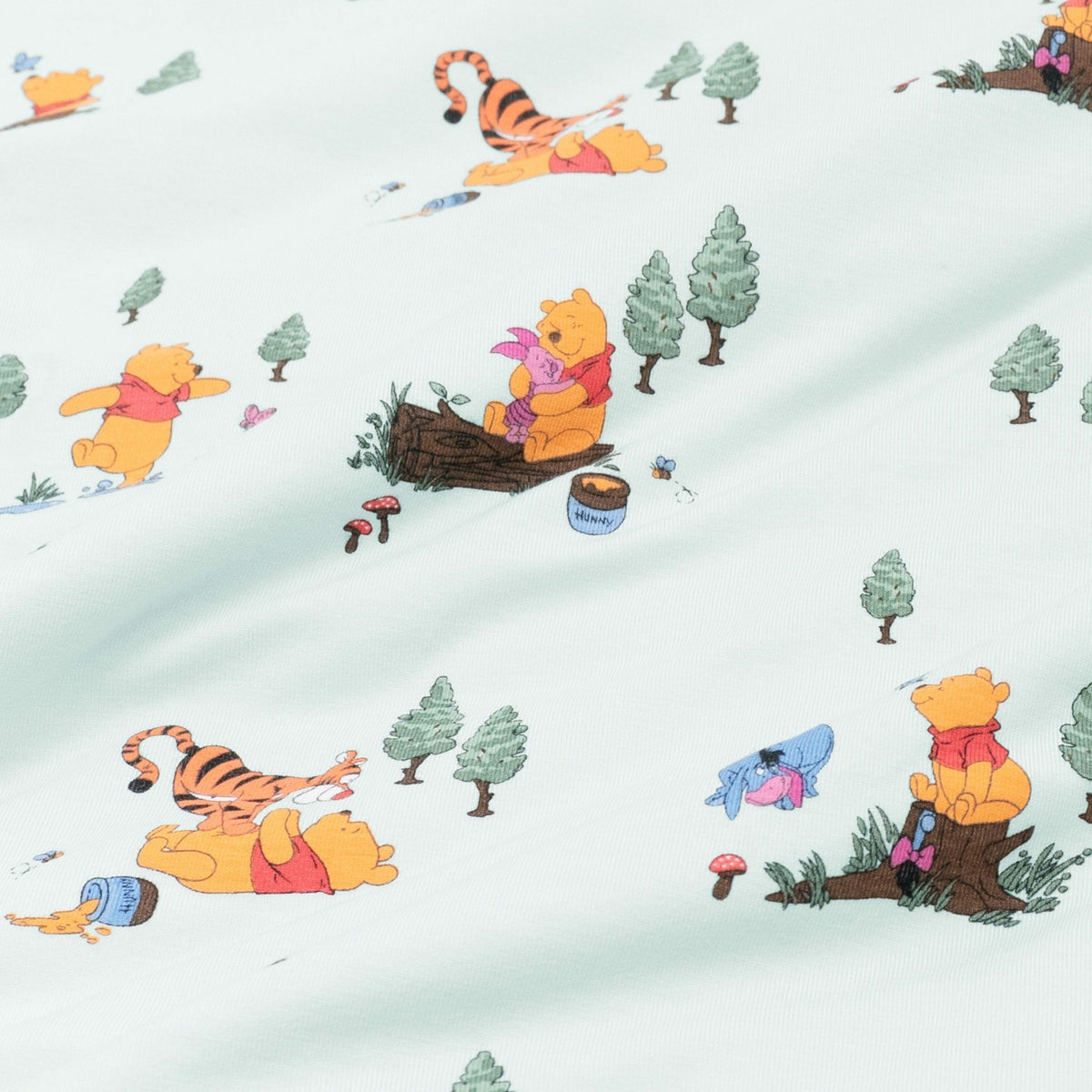 Kyte Baby Change Pad Cover in Winnie the Pooh Hundred Acre Wood