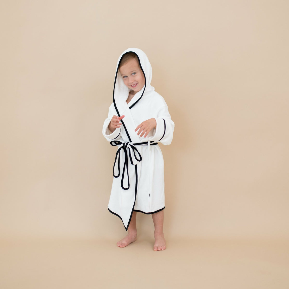 Kyte Baby Hooded Bath Robe in Cloud with Midnight Trim
