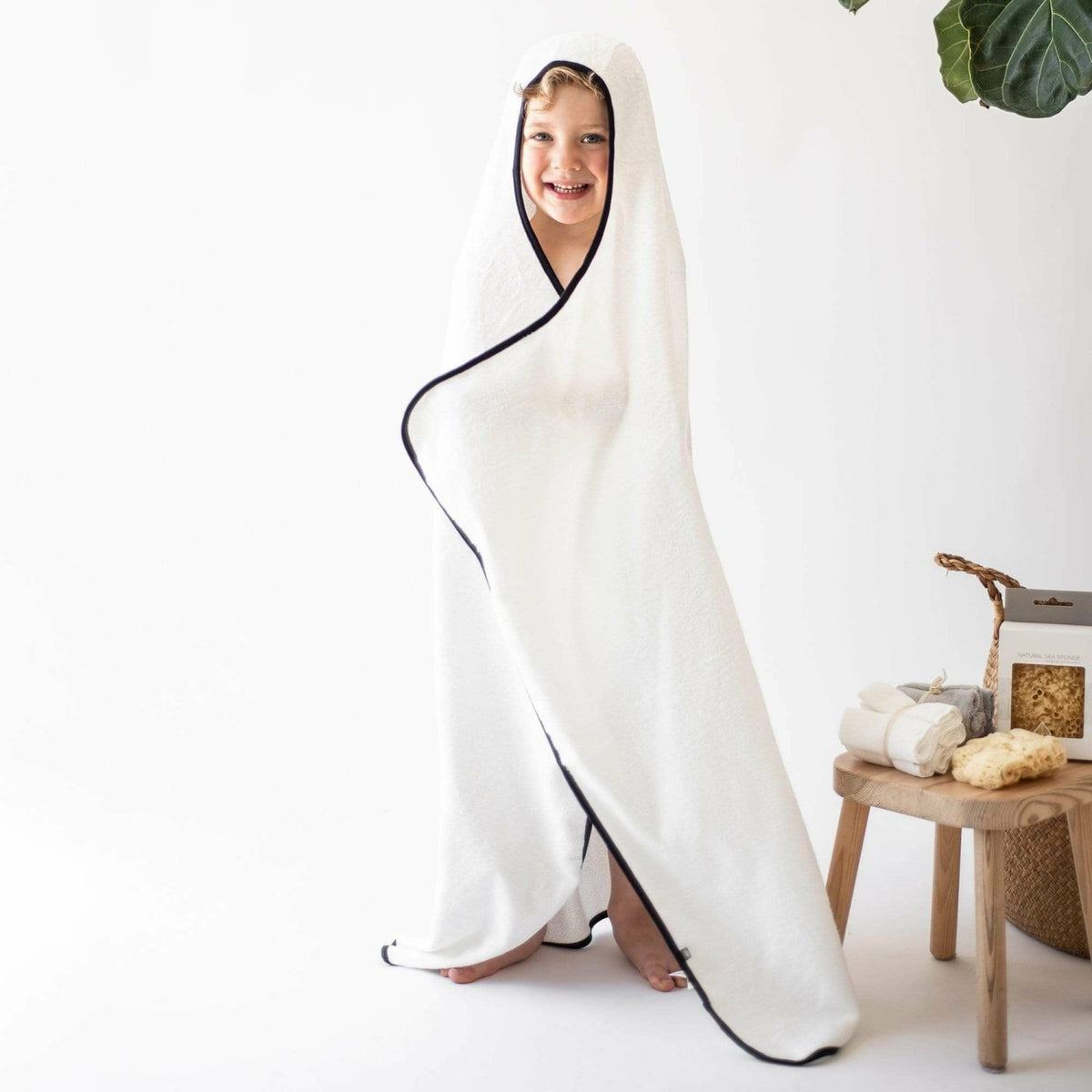 Kyte Baby Toddler Hooded Bath Towel in Cloud with Midnight Trim