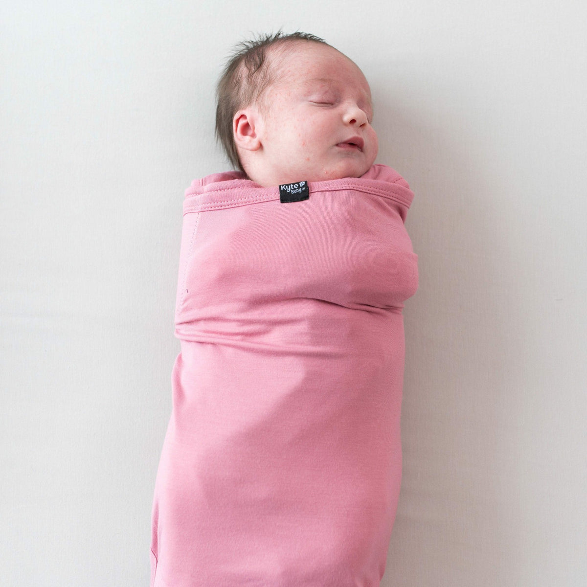 Kyte Baby Sleep Bag Swaddler in Apple Blossom 1.0