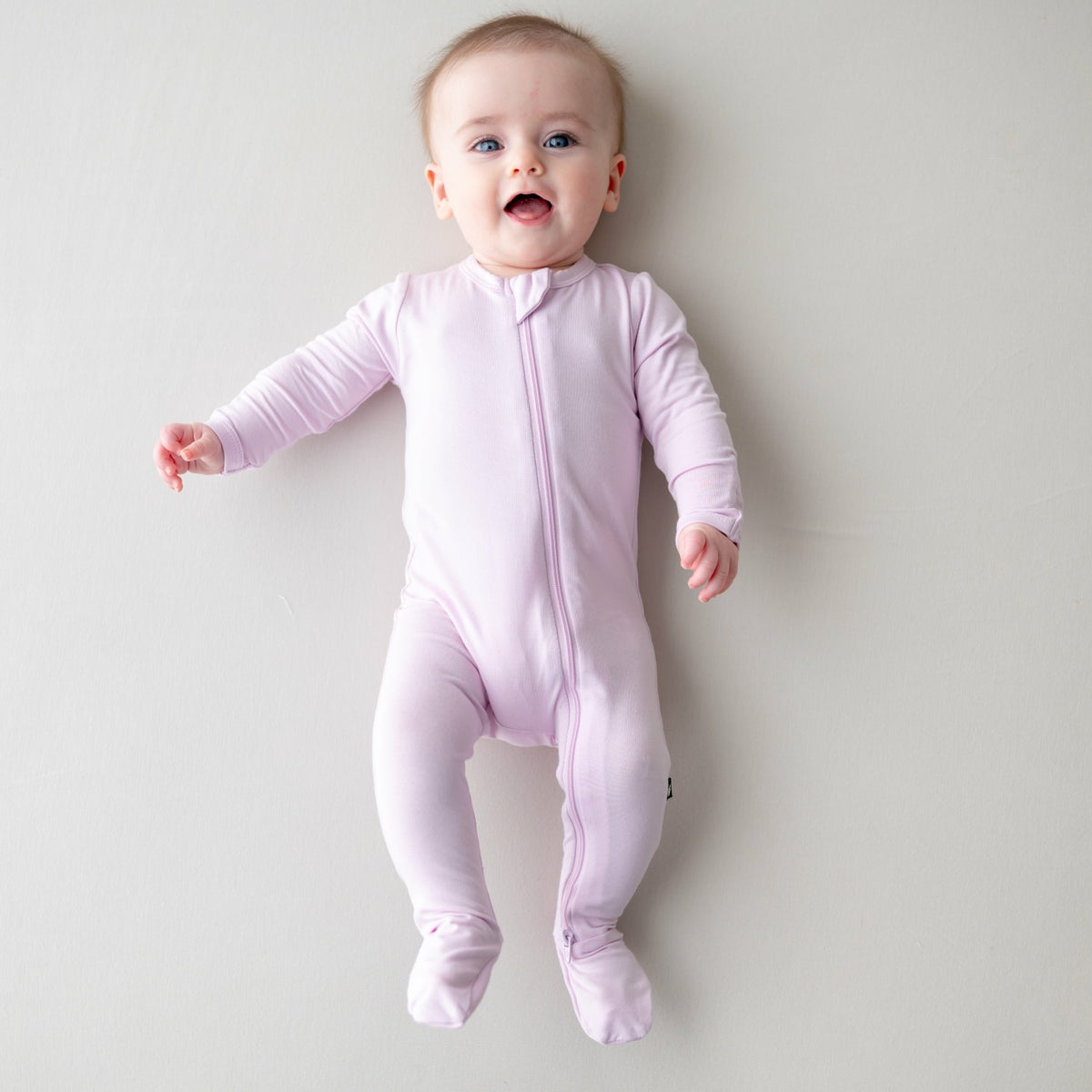 Kyte Baby Zippered Footie in Thistle