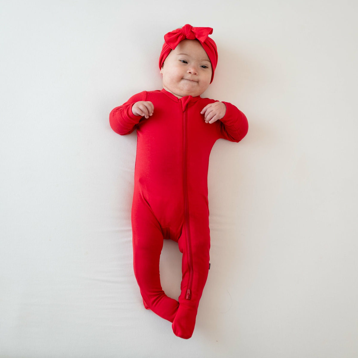 Kyte Baby Zippered Footie in Cardinal