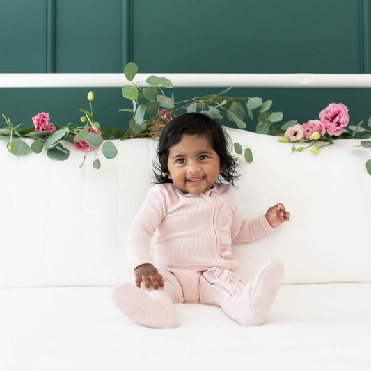Kyte Baby Ribbed Ruffle Bamboo Zipper Footie in Blush