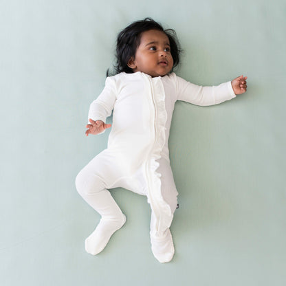 Kyte Baby Ribbed Ruffle Zipper Footie in Cloud
