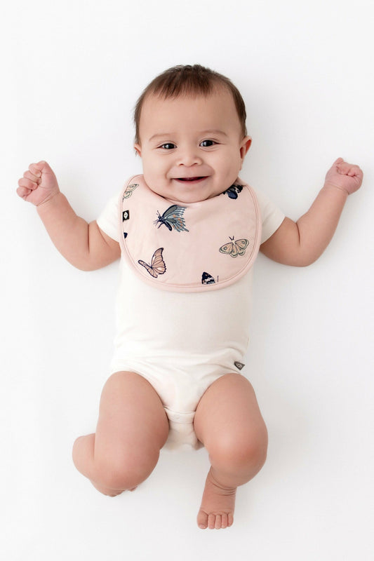 Kyte Baby Cushy Bib in Blush Butterfly