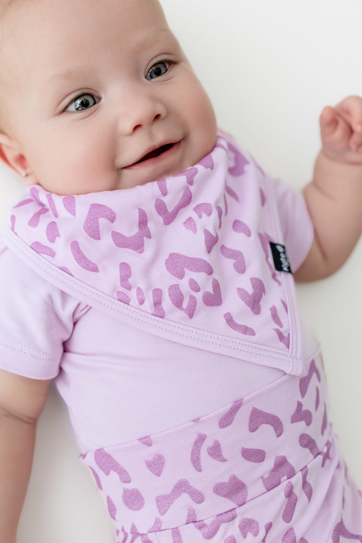 Kyte Baby Bib in Thistle Leopard