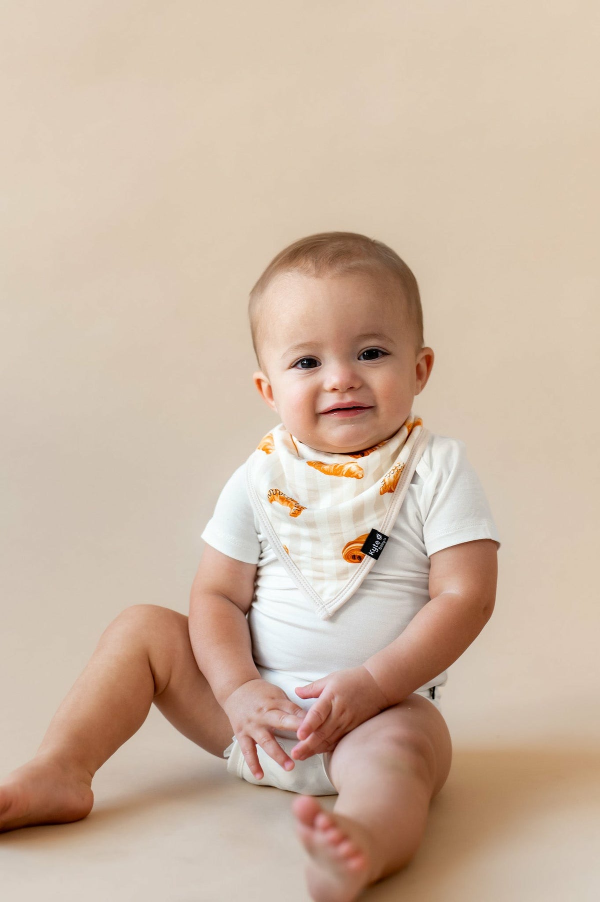 Kyte Baby Bib in Croissant