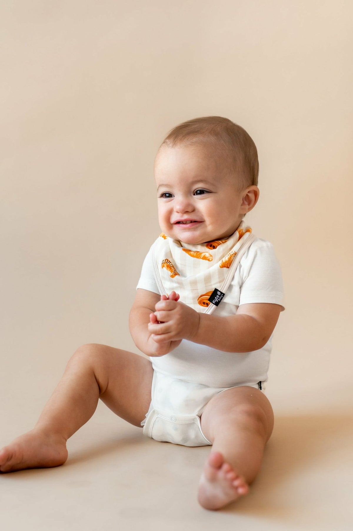 Kyte Baby Bib in Croissant