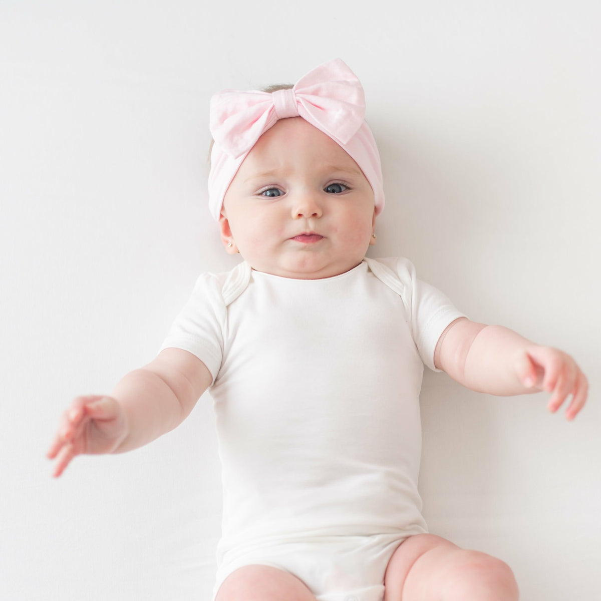 Kyte Baby Bow Headband in Sakura