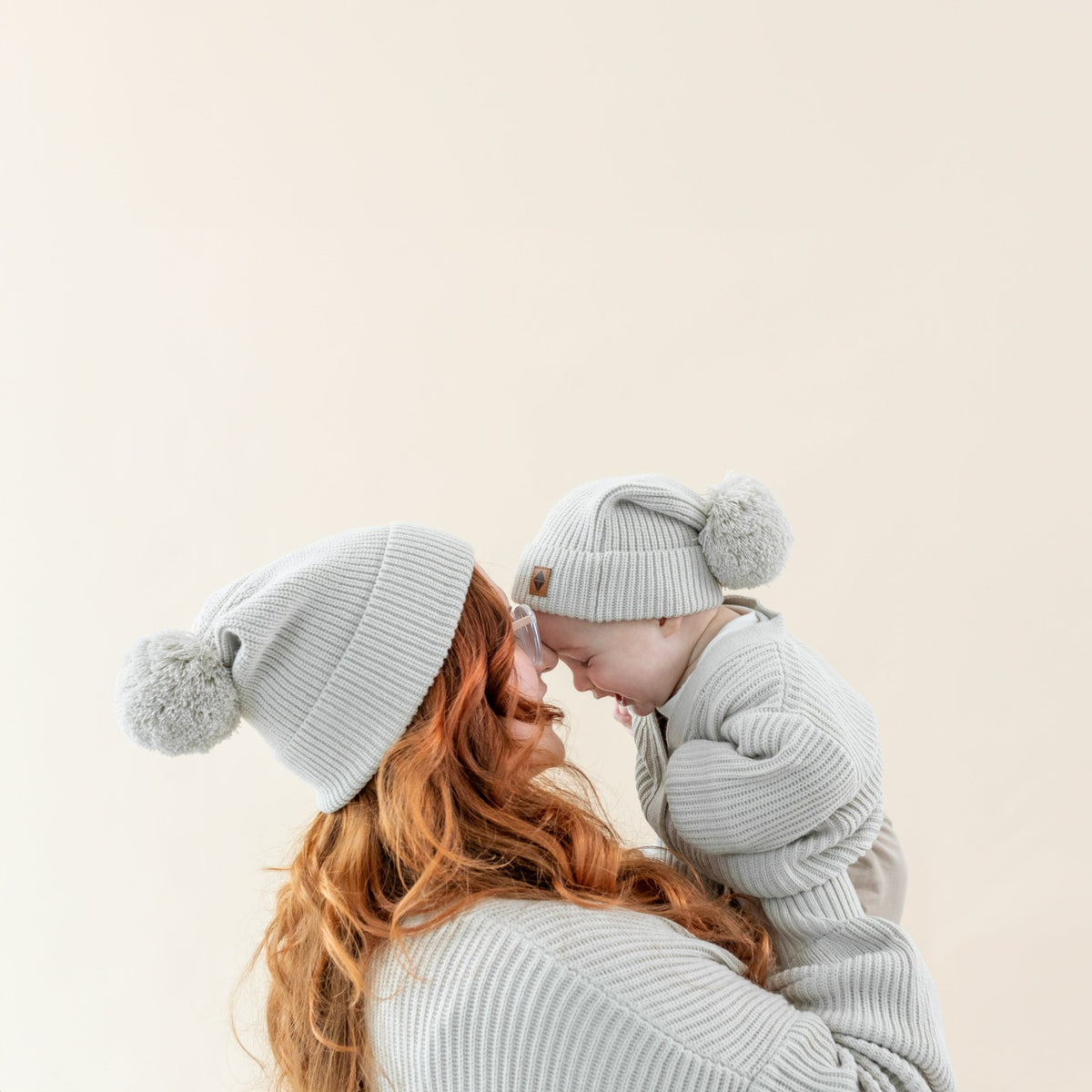 Kyte Baby Chunky Knit Pom Beanie in Oat