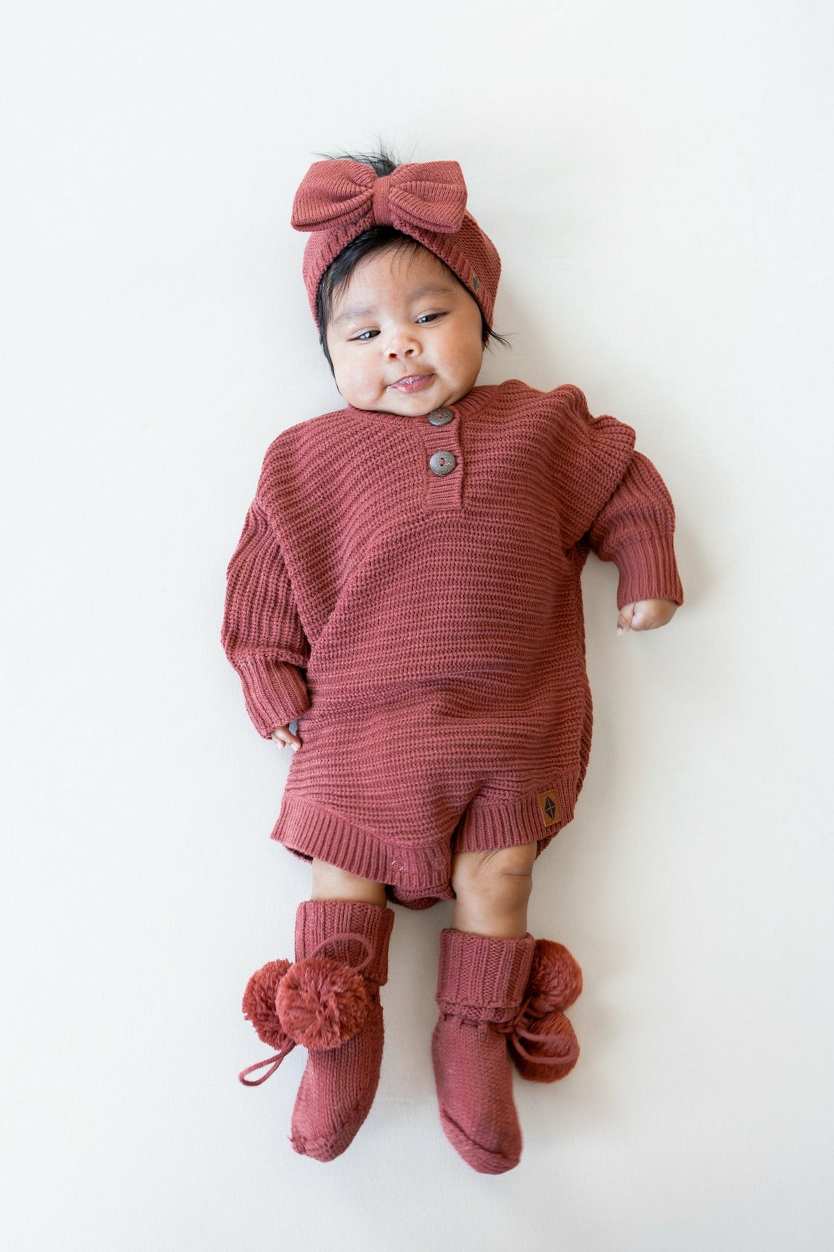 Kyte Baby Knit Booties in Ember