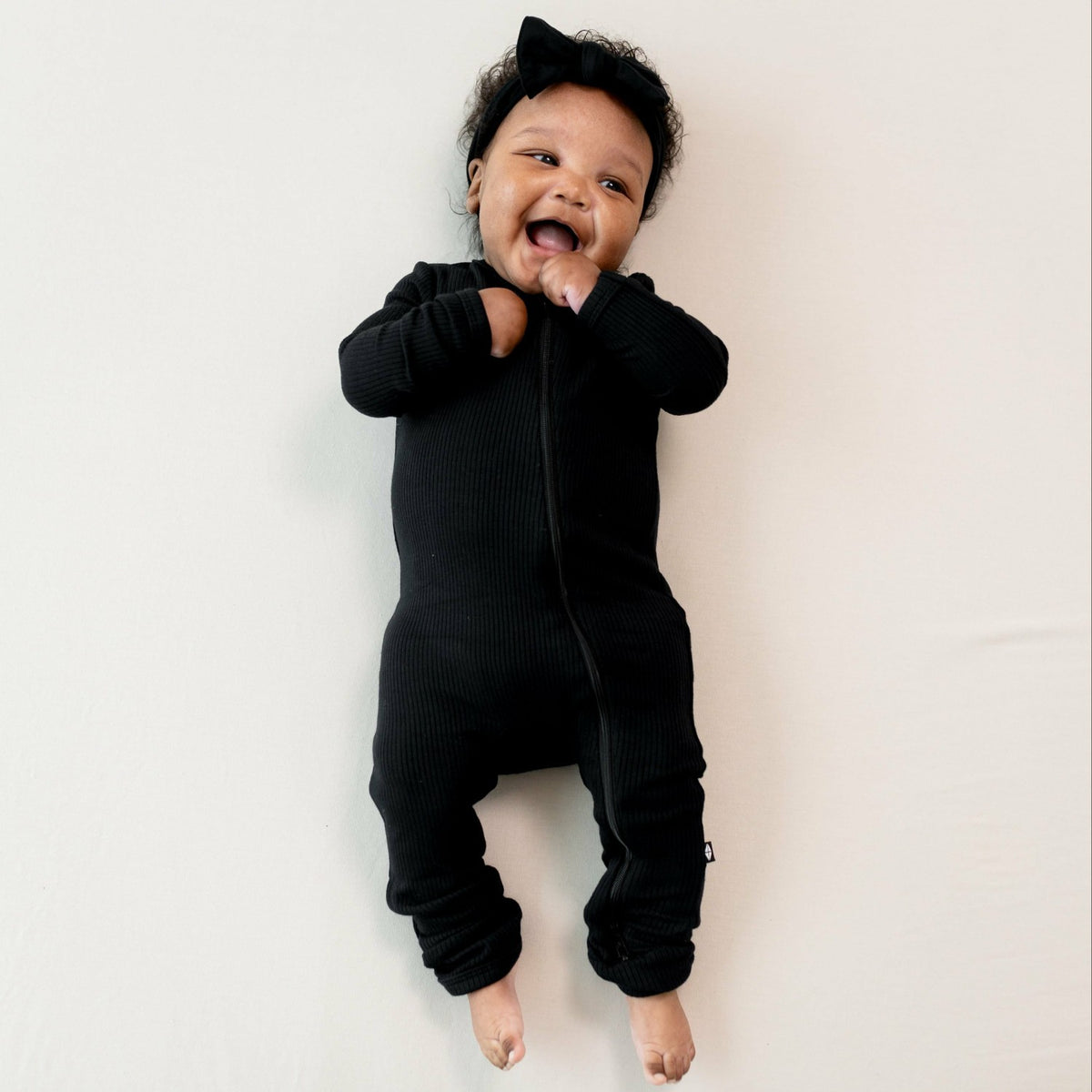 Kyte Baby Ribbed Zipper Romper in Midnight