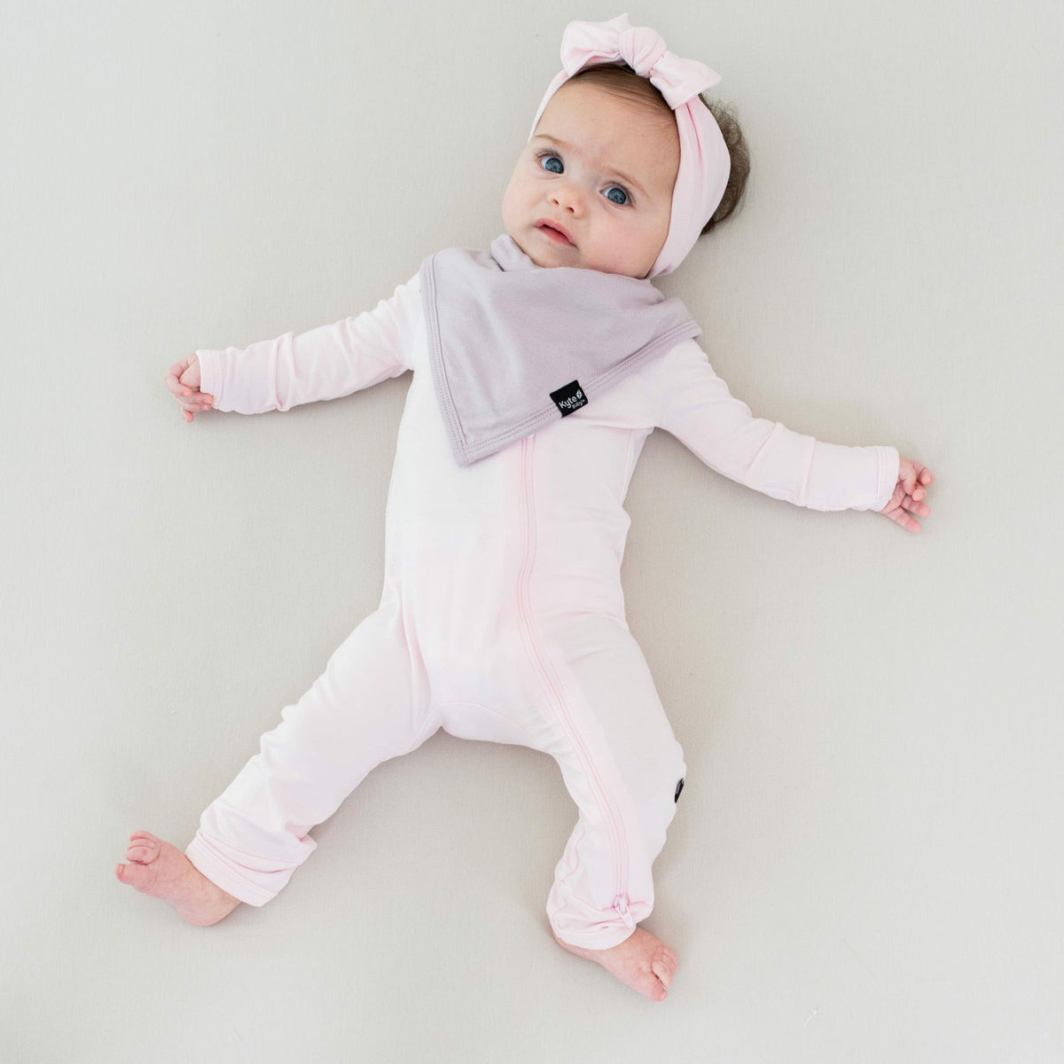 Kyte Baby Zippered Romper in Sakura