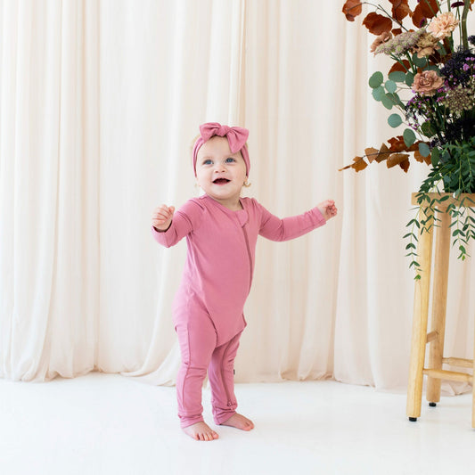 Kyte Baby Zippered Romper in Apple Blossom