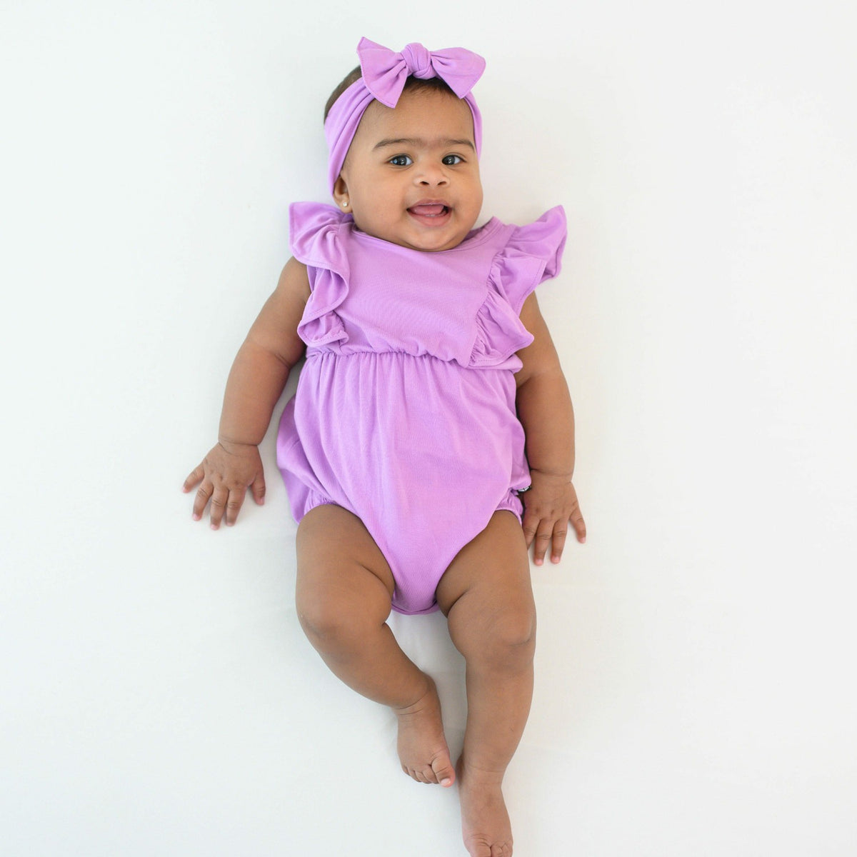 Kyte Baby Bubble Romper in Poi