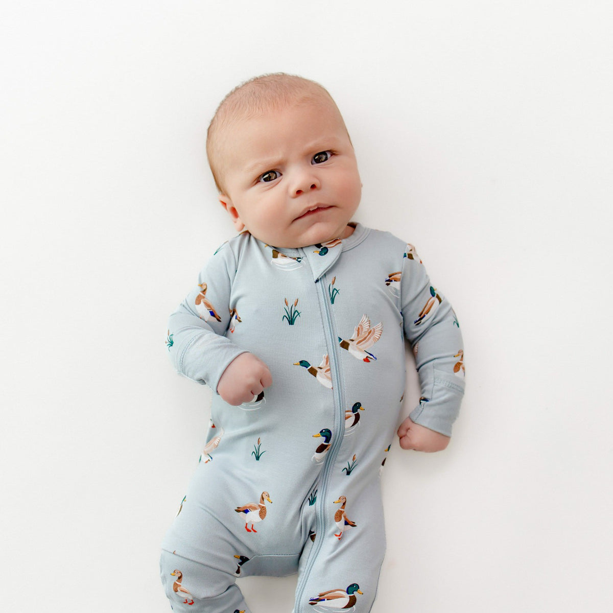Kyte Baby Zippered Romper in Mallard Duck