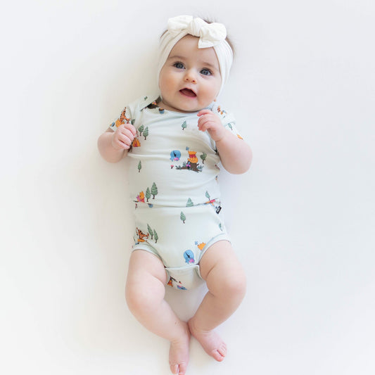 Kyte Baby Bodysuit in Winnie the Pooh Hundred Acre Wood