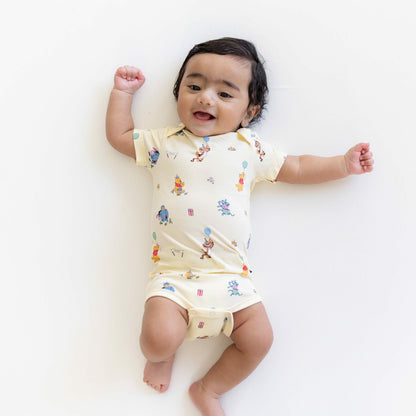 Kyte Baby Bodysuit in Winnie the Pooh Celebration