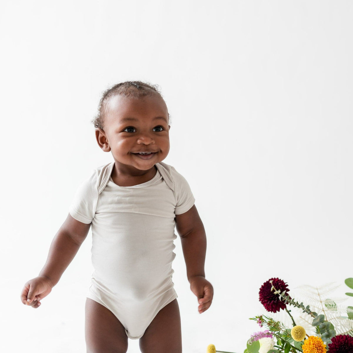 Kyte Baby Bamboo Bodysuit in Oat