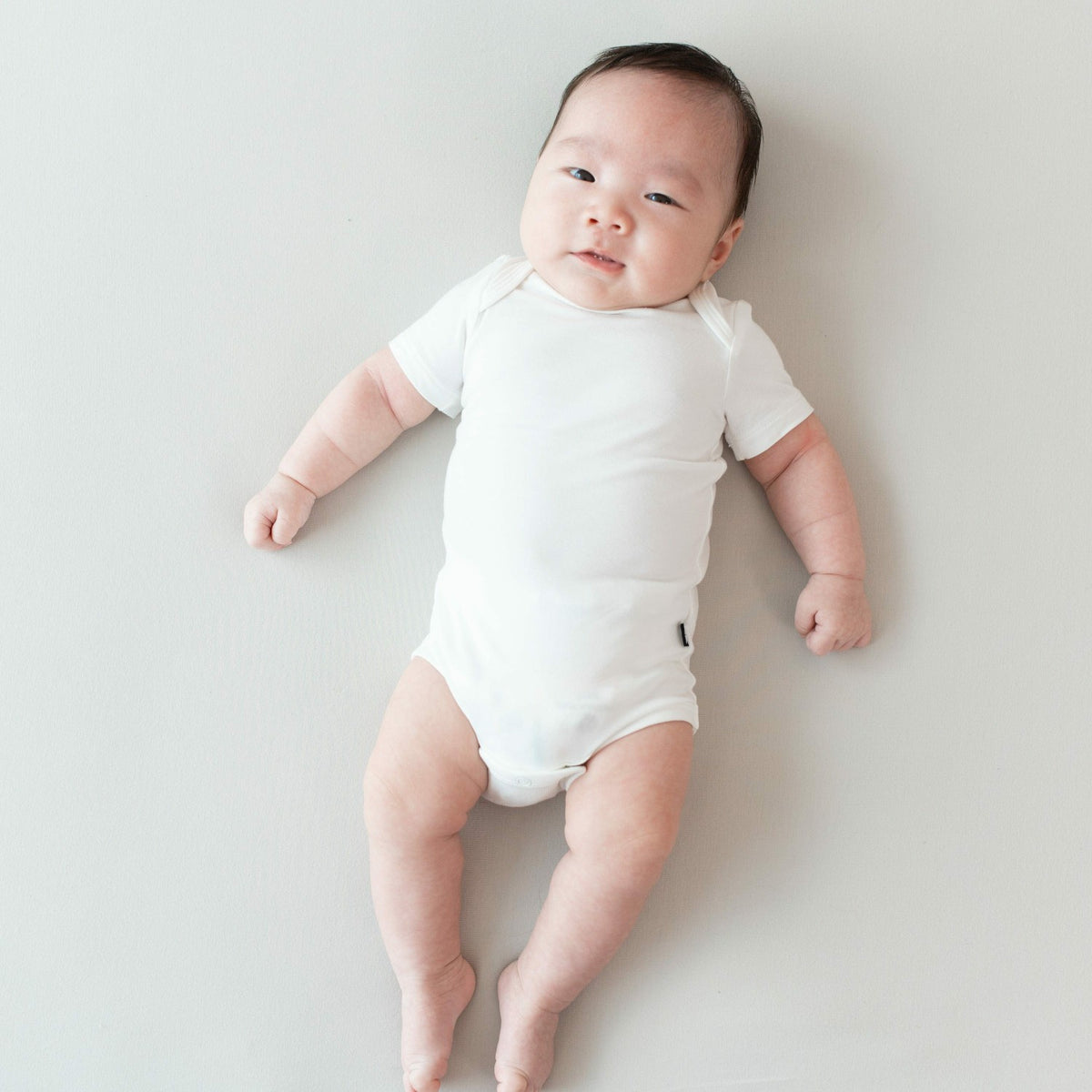 Kyte Baby Bodysuit in Cloud