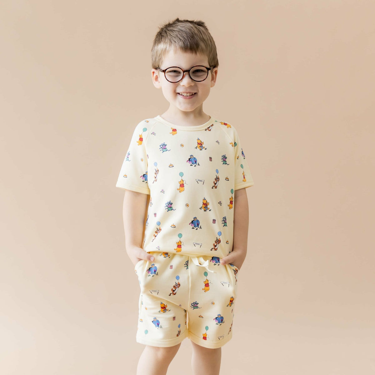 Kyte Baby Short Sleeve Jogger Set in Winnie the Pooh Celebration